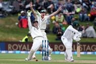 DUNEDIN, NEW ZEALAND - MARCH 11:  BJ Watling (L) and Jimmy Neesham of New Zealand unsuccessfully appeal for the dismissal of JP Duminy of South Africa during day four of the First Test match between New Zealand and South Africa at University Oval on March 11, 2017 in Dunedin, New Zealand.  (Photo by Dianne Manson/Getty Images)